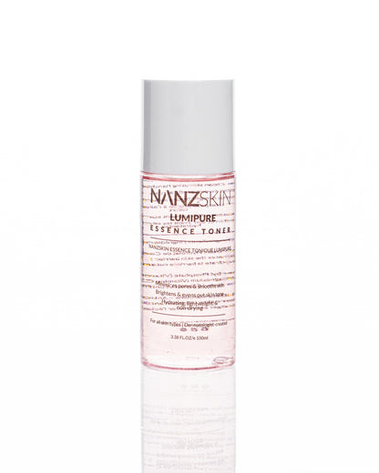 A pump bottle of Nanzskin Lumipure Essence Toner with clear liquid visible inside.